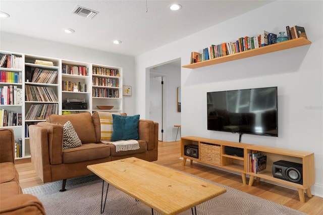 living room with hardwood / wood-style flooring