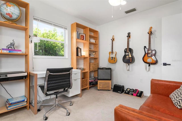 office area featuring light colored carpet