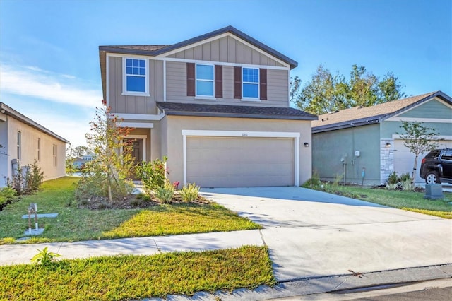 front of property with a garage and a front lawn