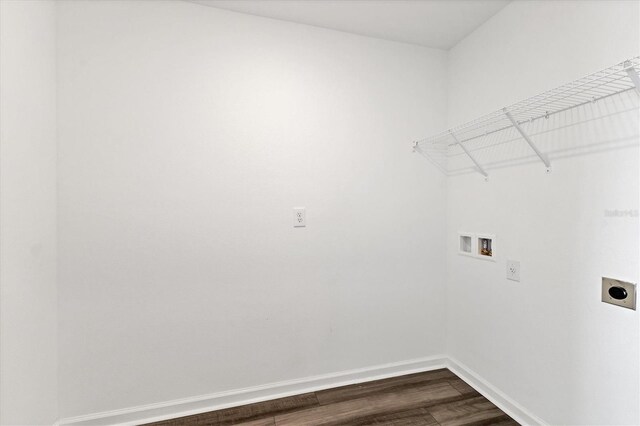 laundry area with hookup for a washing machine, dark hardwood / wood-style floors, and electric dryer hookup