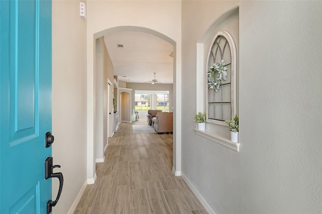 hall with light wood-type flooring