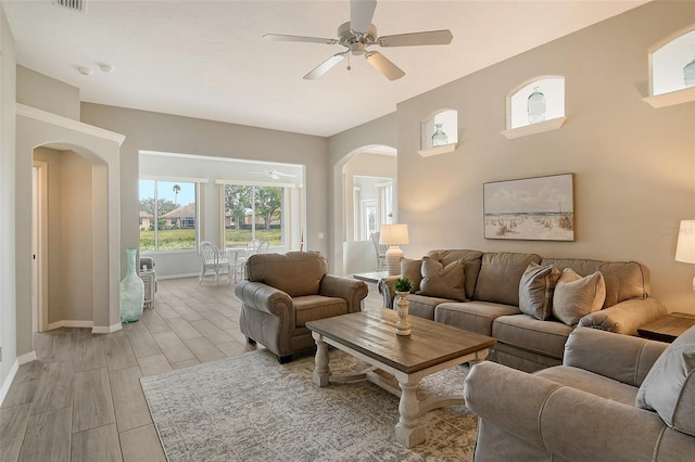 living room featuring ceiling fan