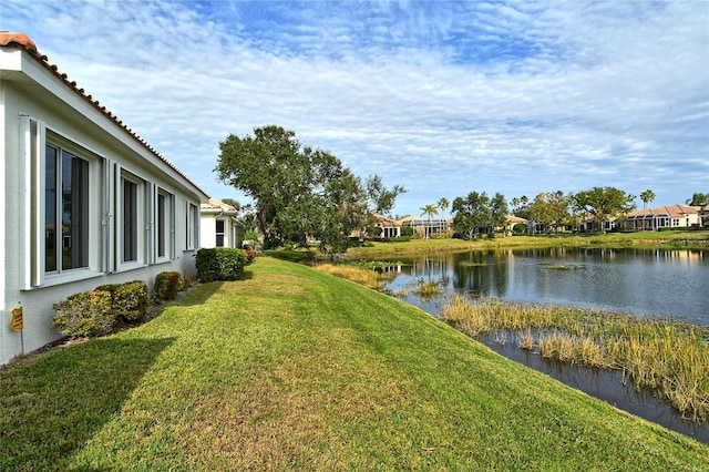 view of yard with a water view