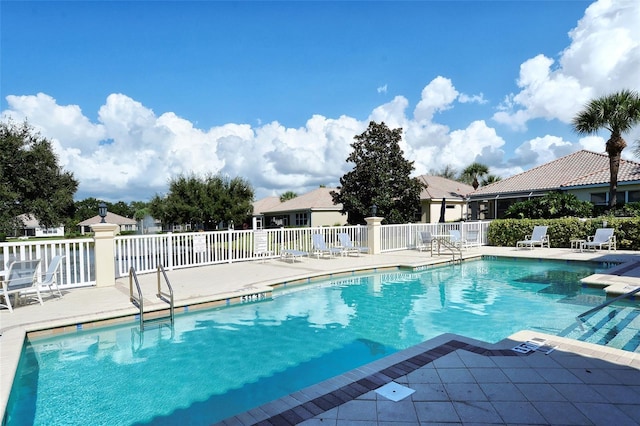 view of pool featuring a patio area