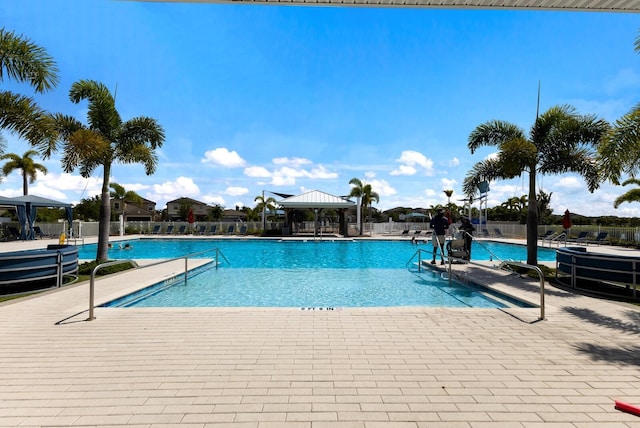 view of swimming pool with a gazebo and a patio