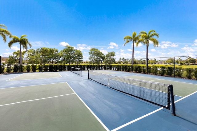 view of tennis court featuring basketball court