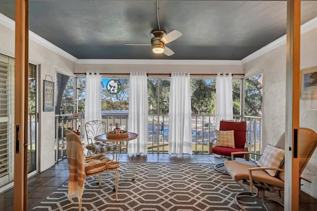 sunroom / solarium with ceiling fan