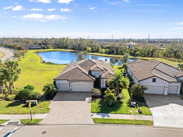 birds eye view of property featuring a water view