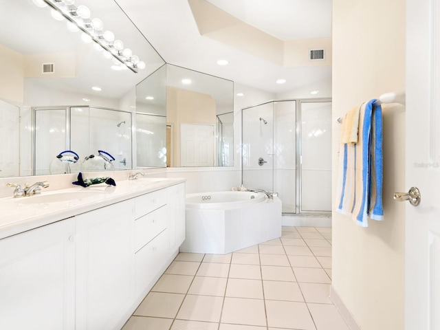 bathroom featuring tile patterned flooring, vanity, and independent shower and bath