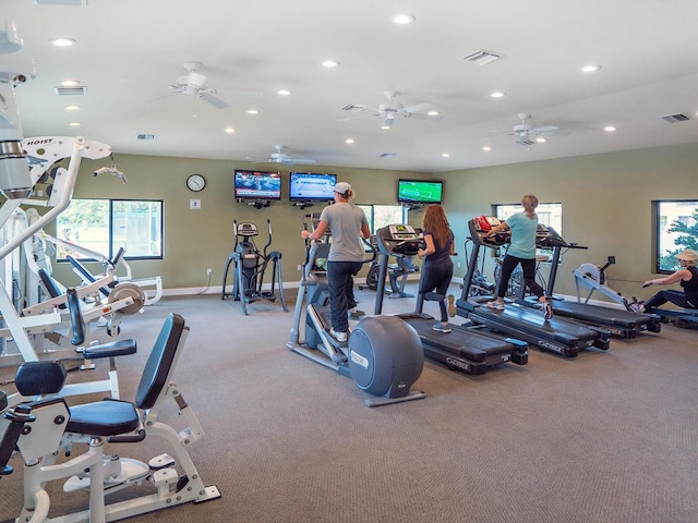 workout area with carpet flooring, a wealth of natural light, and ceiling fan