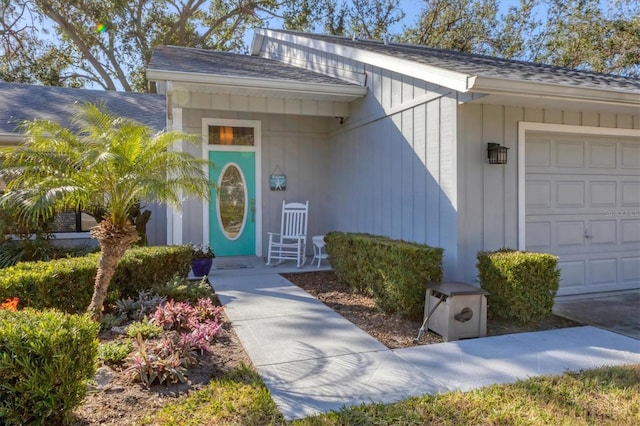 property entrance with a garage