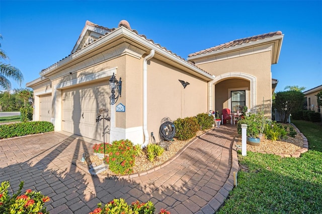 view of front of property featuring a garage