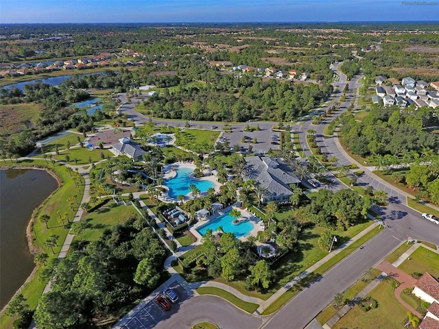 birds eye view of property featuring a water view