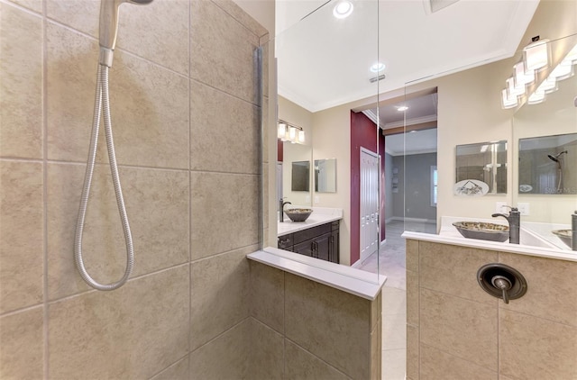 bathroom featuring baseboards, walk in shower, crown molding, vanity, and recessed lighting