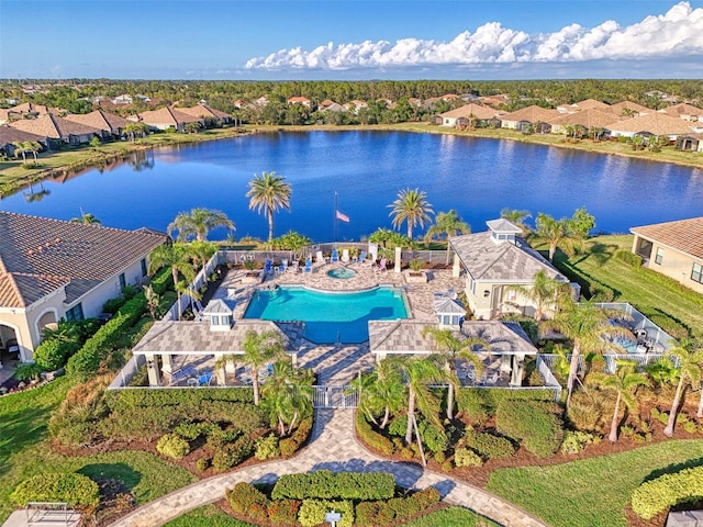 bird's eye view with a residential view and a water view