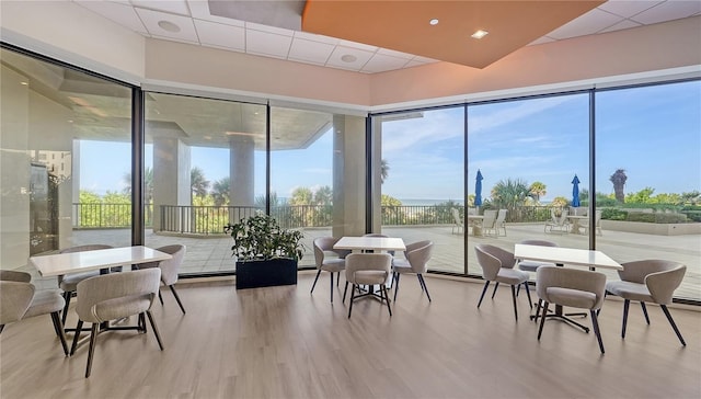 sunroom with a drop ceiling