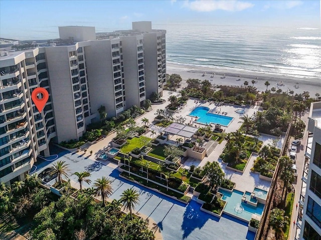 bird's eye view with a view of the beach and a water view