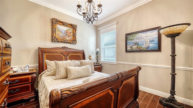 bedroom with a notable chandelier and crown molding