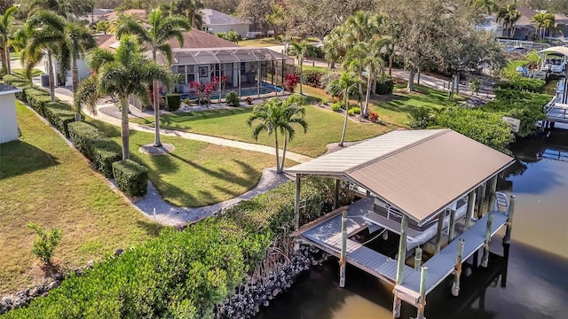 birds eye view of property featuring a water view