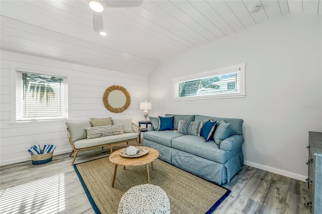 living room featuring wooden ceiling, hardwood / wood-style flooring, ceiling fan, and lofted ceiling