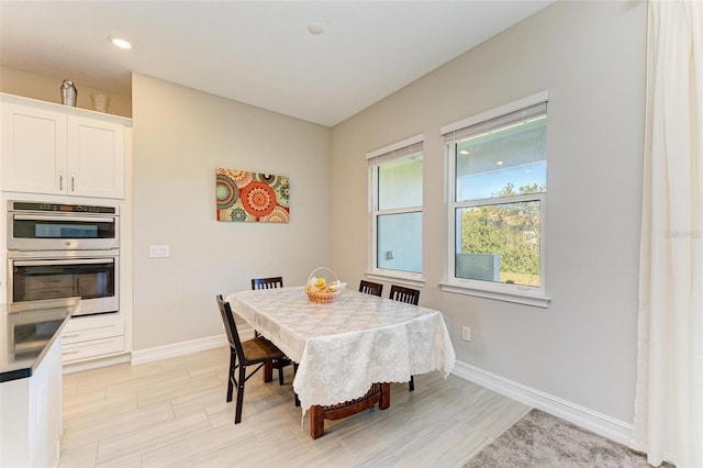 dining room featuring light wood-type flooring