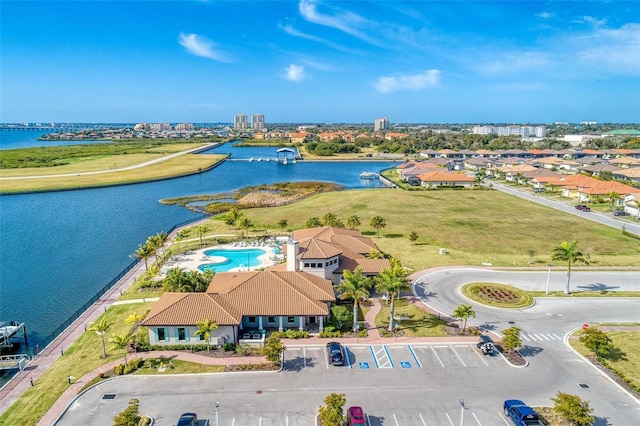 birds eye view of property featuring a water view