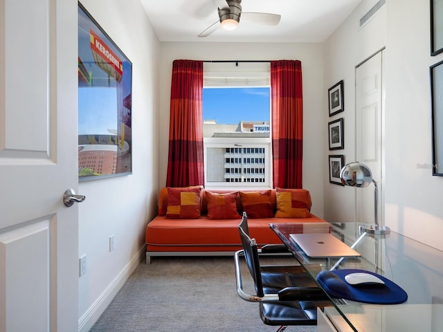 interior space with ceiling fan