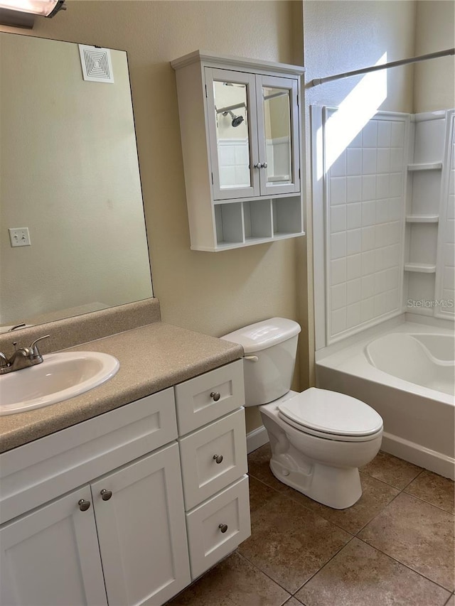 full bathroom featuring tile patterned floors, vanity, toilet, and washtub / shower combination