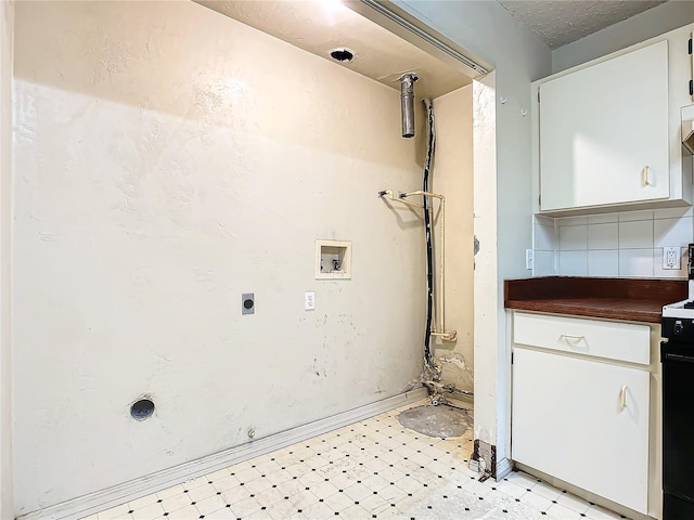 laundry area featuring hookup for an electric dryer and hookup for a washing machine