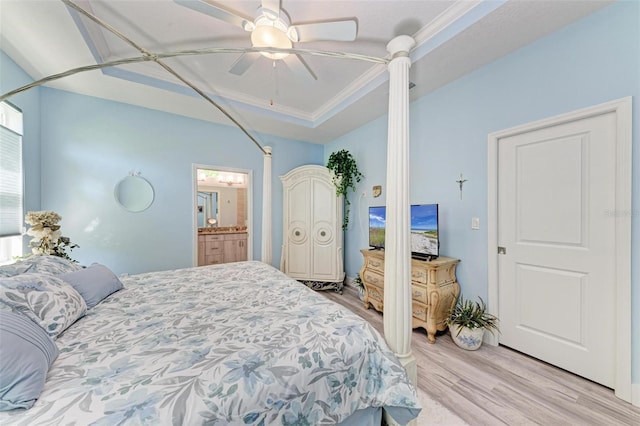 bedroom featuring ensuite bath, ceiling fan, crown molding, and light hardwood / wood-style floors