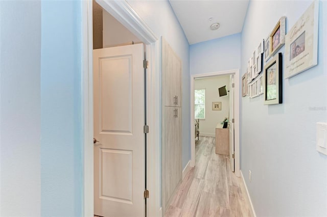 hallway featuring light hardwood / wood-style flooring