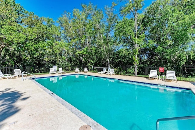 view of pool with a patio area