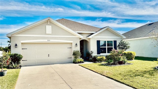 ranch-style house featuring a garage and a front lawn