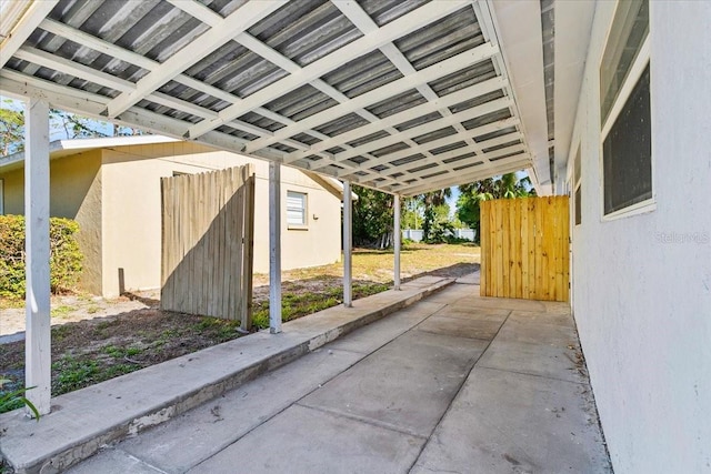 exterior space with a carport