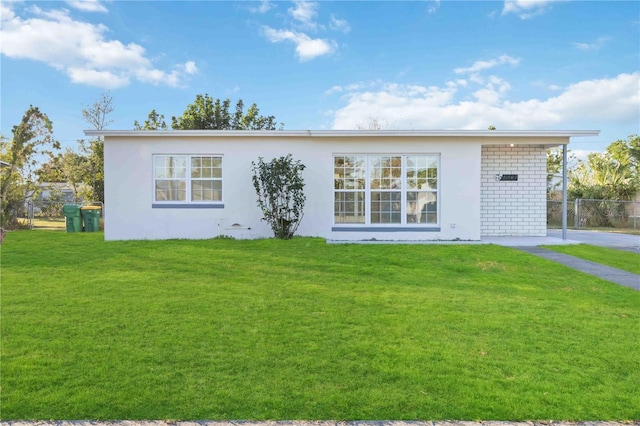 view of front of home with a front yard