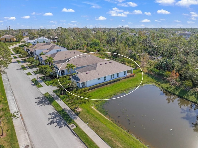 bird's eye view with a water view