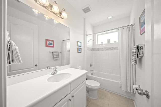 full bathroom featuring tile patterned flooring, shower / bath combination with curtain, toilet, and vanity