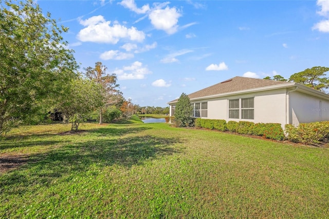 view of yard featuring a water view