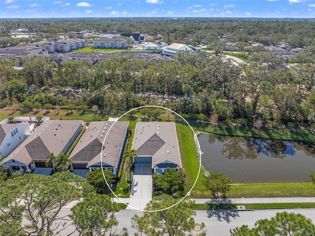 drone / aerial view with a water view