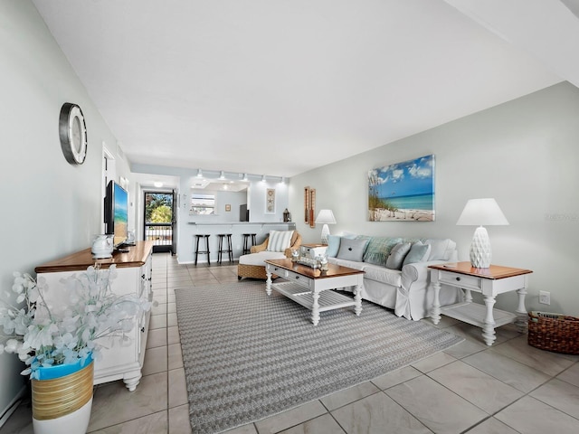 living room with light tile patterned floors