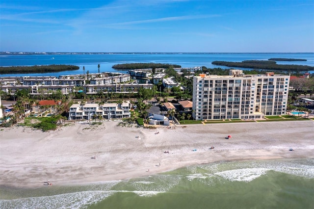 bird's eye view featuring a beach view and a water view