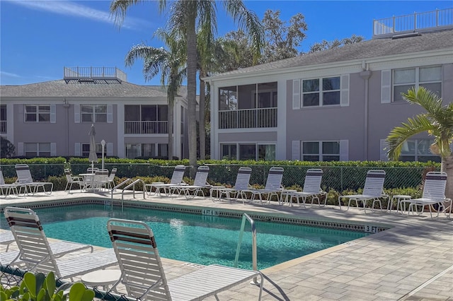 view of swimming pool featuring a patio