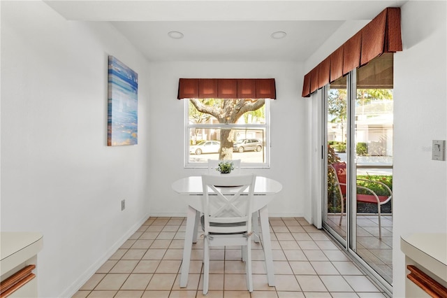 5697 Sheffield Greene Cir Unit 51, Sarasota, FL 34235 - dining area with light tile patterned floors
