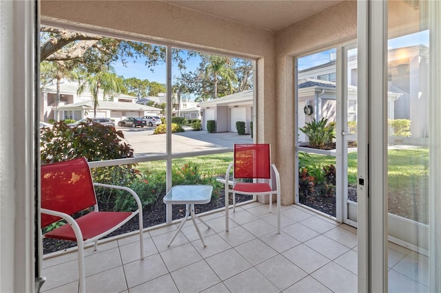 5697 Sheffield Greene Cir Unit 51, Sarasota, FL 34235 - sunroom with a residential view