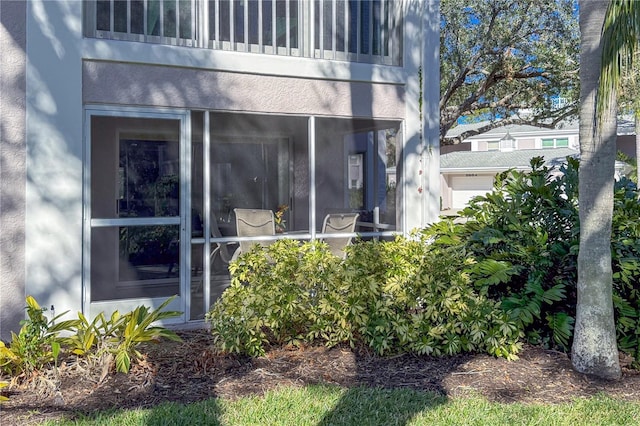 5697 Sheffield Greene Cir Unit 51, Sarasota, FL 34235 - view of side of property featuring stucco siding