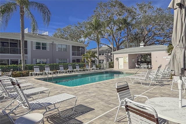 5697 Sheffield Greene Cir Unit 51, Sarasota, FL 34235 - community pool featuring a patio area