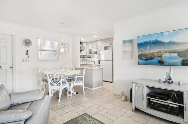 dining room featuring crown molding