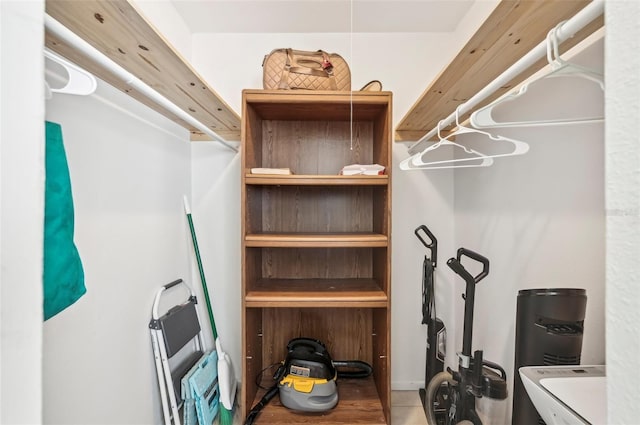 spacious closet featuring tile patterned floors