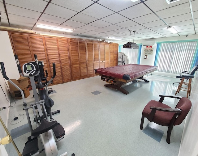 playroom with a paneled ceiling and pool table