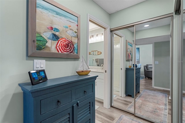 hallway featuring light hardwood / wood-style floors